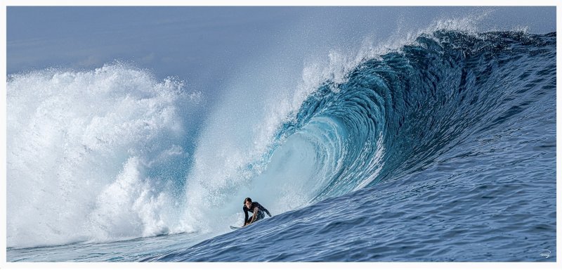 Surfeur et sa vague