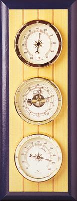 Stazione barometrica in ottone su tavola di legno bordo blu