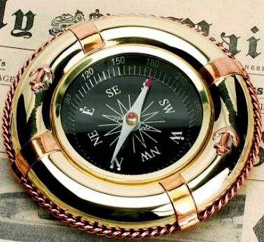 Bussola salvagente-fermacarte in ottone